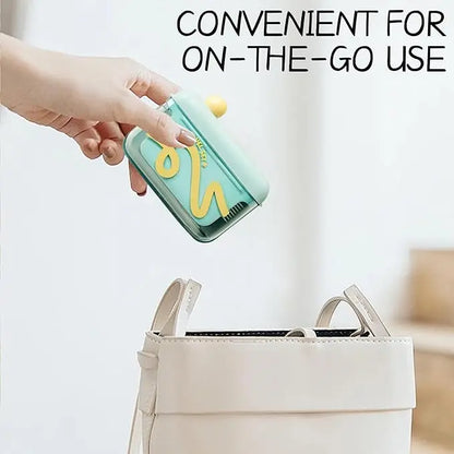 Travel-sized storage case - features an automatic pop-up dispenser, portable and refillable